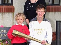 Olympic torch-bearer makes school's day