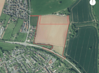 Village housing plan scaled back