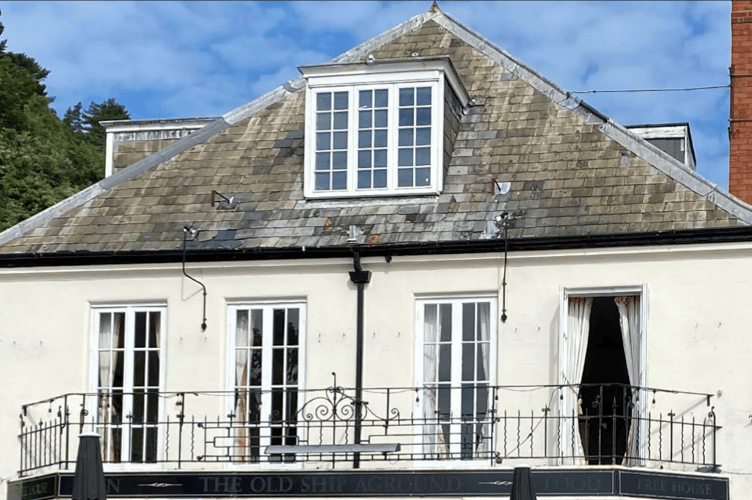 How the roof of the Old Ship Aground looked when Hall and Woodhouse purchased the pub.