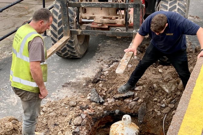 Contractors start to dig up the Minehead Harbour cannons.