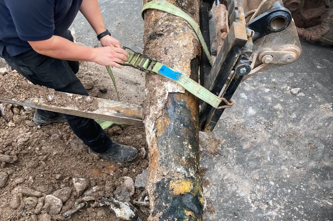 Contractors load up one of the Minehead Harbour cannons for removal.