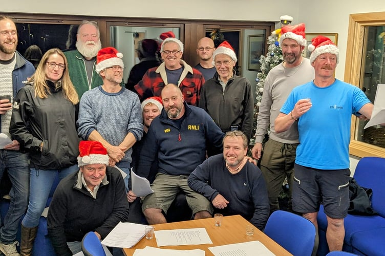 Lifeboat crews in Minehead have been warming up for their 'Carols in the Boathouse' performance on Friday.