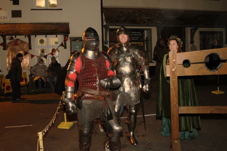 Knights at the stocks during last month's festival.