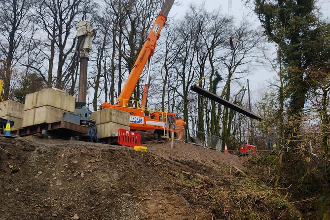 A 50-tonne crane at work repairing a B3224 embankment on Exmoor.