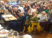 Minehead street choir sing for their supper