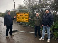 Cliff top road closed to traffic now open for walkers