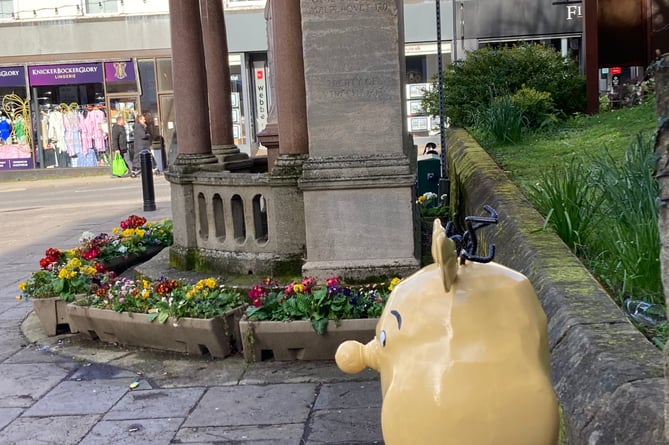 he metalhead next to Queen Anne's statue