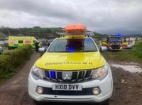 Holidaymaker stuck in mud with tide turning