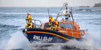 RNLI 200th anniversary scroll being delivered by sea