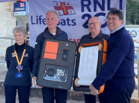 Lifeboat volunteers and supporters sign 200th anniversary scroll