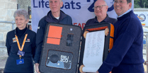 Lifeboat volunteers and supporters sign 200th anniversary scroll