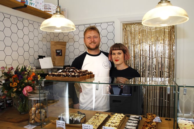 Nikki Seymour and Sam Taylor behind the counter of newly-opened Porlock shop Bake Me Crazy.