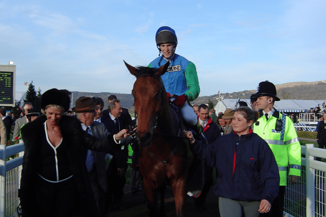 Darren Edwards returning to the winners enclosure on Maximize