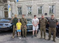 Ten-year-old William takes aid for frontline Ukraine troops