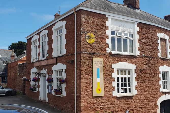 A fund-raising 'thermometer' can be seen on the side of the Globe Inn, Milverton, which the village hopes will become community owned.