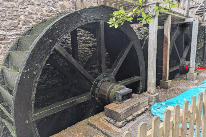 The red arrow points to the Dunster Water Mill waterwheel axle which needs to be replaced. PHOTO: National Trust.