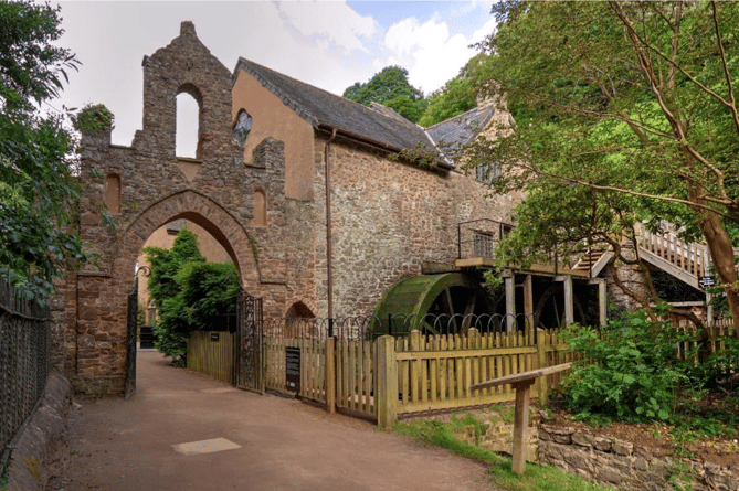 Dunster Water Mill with its two waterwheels. National Trust