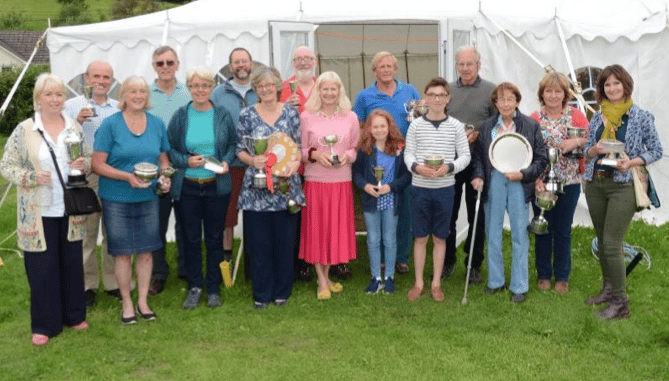 Trophy winners from a Bicknoller Flower Show of a few years ago.