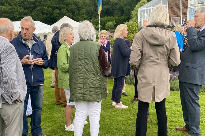 Guests at the annual garden party fund-raiser for DWLCT.