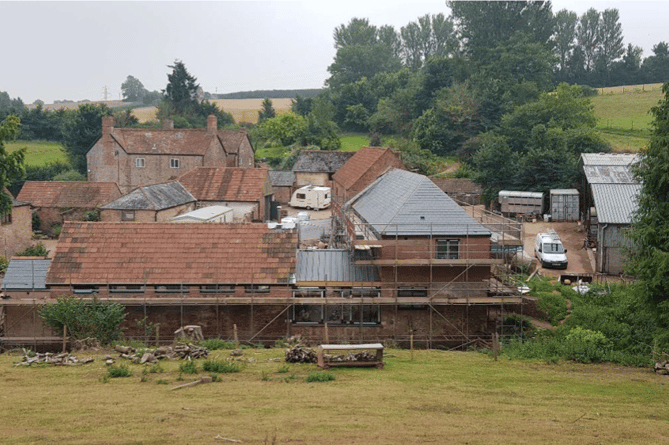 Manor Farm, Sampford Brett, viewed during building works from valley behind. PHOTO: Vere Kennett.