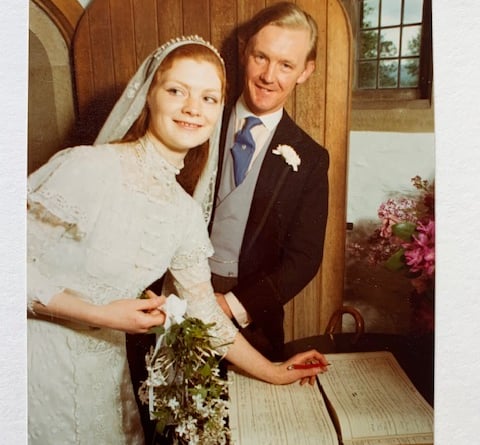 Rollo and Janie Clifford sign the register after their wedding in the Lynch Chapel, Selworthy, in 1974.