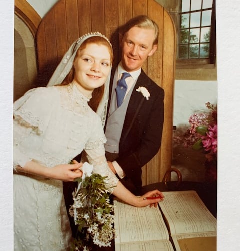 Rollo and Janie Clifford sign the register after their wedding in the Lynch Chapel, Selworthy, in 1974.