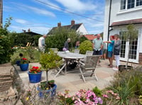 Neighbours visit each other's gardens and take tea