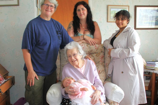 FIVE GENERATIONS: Jean Warrey holds great-great-granddaughter Sarai-Leilani for the first time surrounded by (left to right) her daughter Deb Garbutt, granddaughter Laura Jean, and great-granddaughter Destiny. PHOTO: George Ody.