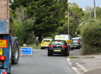 Road closed after car collides with parked vehicles in Williton