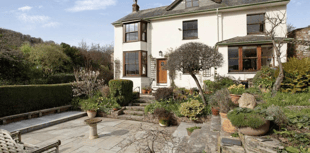 Detached family home with views of Dunster Castle hits the market