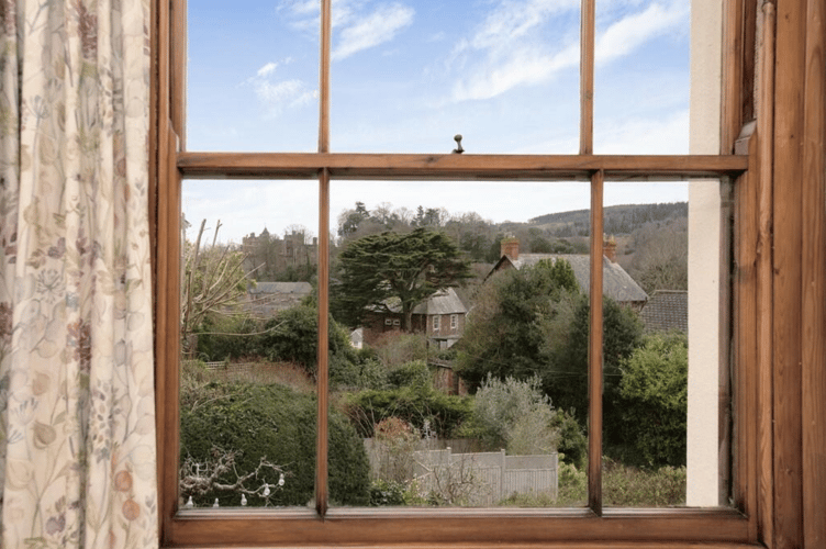 Detached family home with views of Dunster Castle hits the market