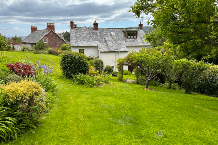 Detached family home with views of Dunster Castle hits the market