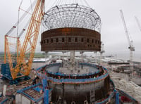 Nuclear power station reactor building has final steel liner fitted