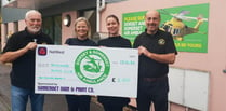 Motor club raises £2,000 for air ambulance charity