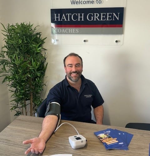 Joshua Strickland, operations director at Hatch Green Coaches, having his blood pressure taken