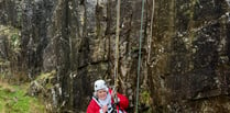 Santa charity cliff abseil raises £2k from all over world