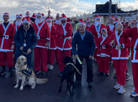 Santa fun run raises funds for guide dogs charity