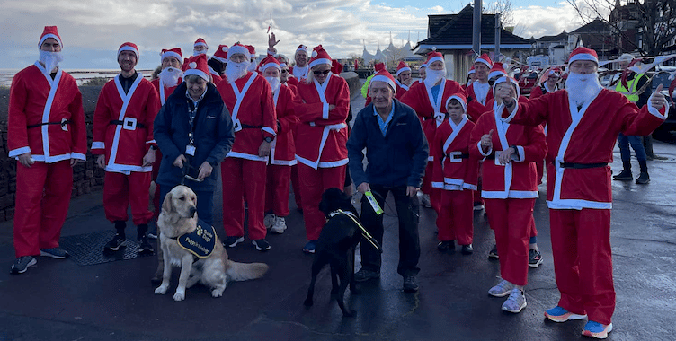 A host of Santas lining up ahead of the annual Minehead Rotary Christmas fun run in aid of Guide Dogs.