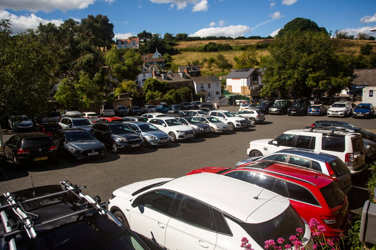 A full carpark at Salcombe, Devon after the coronavirus lockdown was eased. 3rd August 2020. See SWNS story SWPLsalcombe. Before and after lockdown pictures show Salcombe - dubbed Chelsea-on-Sea - overrun with tourists as fears rise of local lockdowns in staycation holiday hotspots.