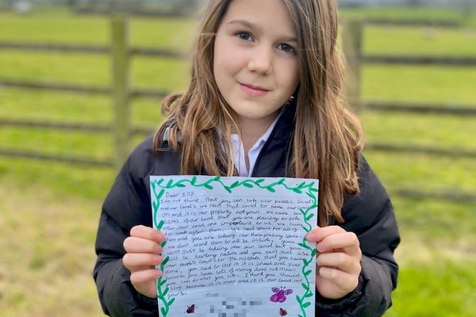 Lily with her letter to EDF. An 11-year-old has written a letter to EDF 'pleading they stop' plans to flood 300 acres of their family's land for a saltmarsh - as part of Hinkley Point C's 'eco' proposal. EDF Energy wants to create a saltmarsh - on land currently used for agriculture, homes and businesses - to mitigate the environmental impact of Hinkley Point C. The nuclear power plant is currently being built and will ingest 44 tonnes of fish a year. EDF wants to compensate the death of the fish by creating the saltmarsh habitat at one of four sites along the River Severn in Somerset - these are between Kingston Seymour, Littleton, Arlingham, and Rodley. 