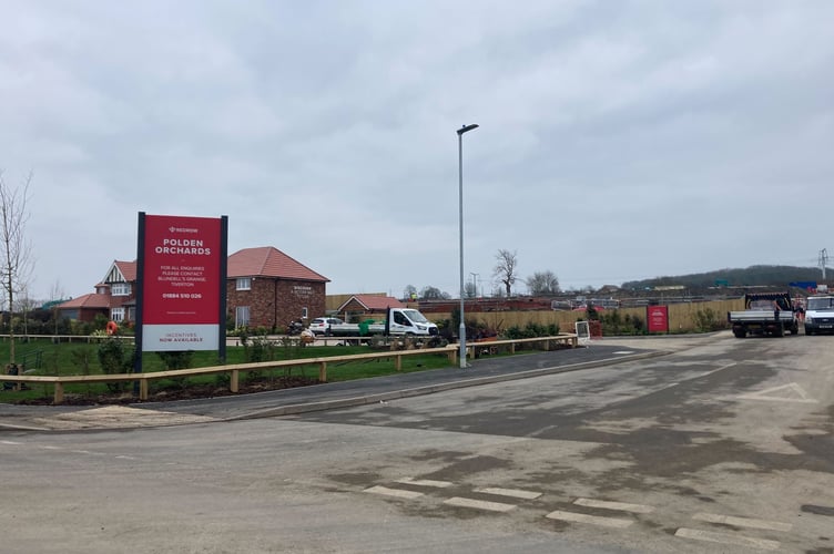 Entrance to he Polden Orchards development of 120 homes on Woolavington Road in Puriton